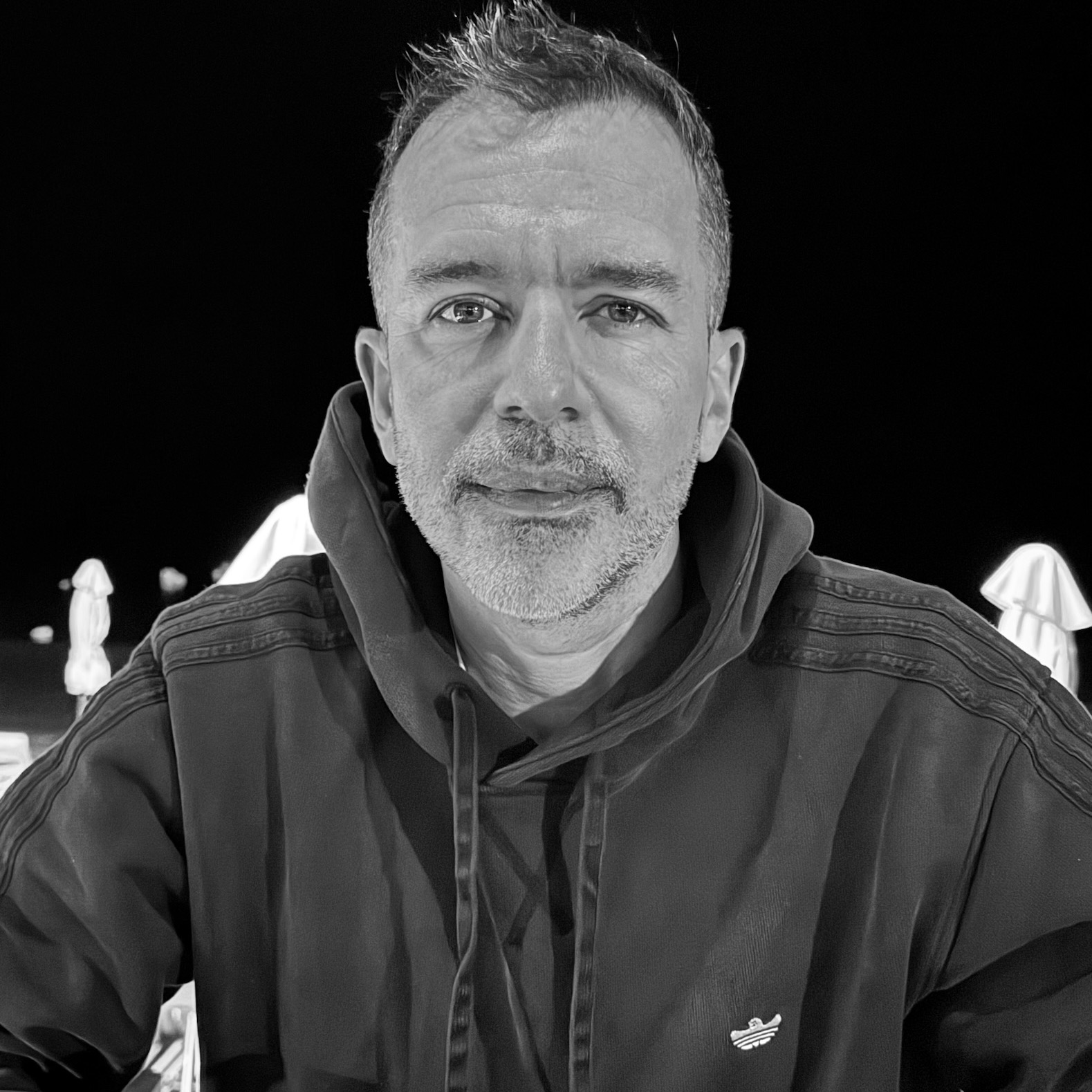 A black and white portrait photo of Martin Hicks.